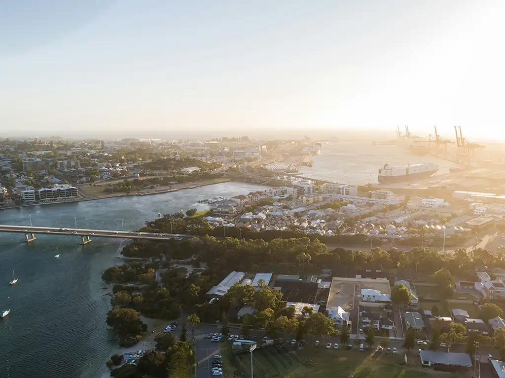 Drone photo of Swan River near Riverside Drive in East Fremantle as the sun sets.