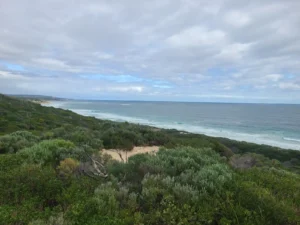 Gas Bay on cloudy day from behind the trail running route on the sand dunes