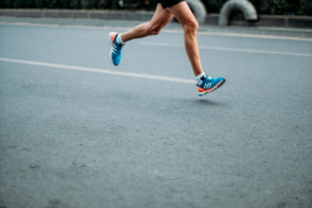 Perth marathon runner's feet as they strike the pavement in Perth CBD.