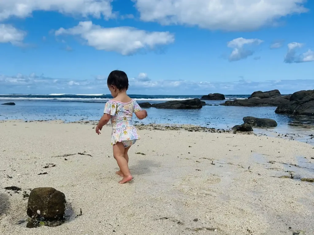 Toddler at family friendly rock pool in Margaret River, southwest Australi